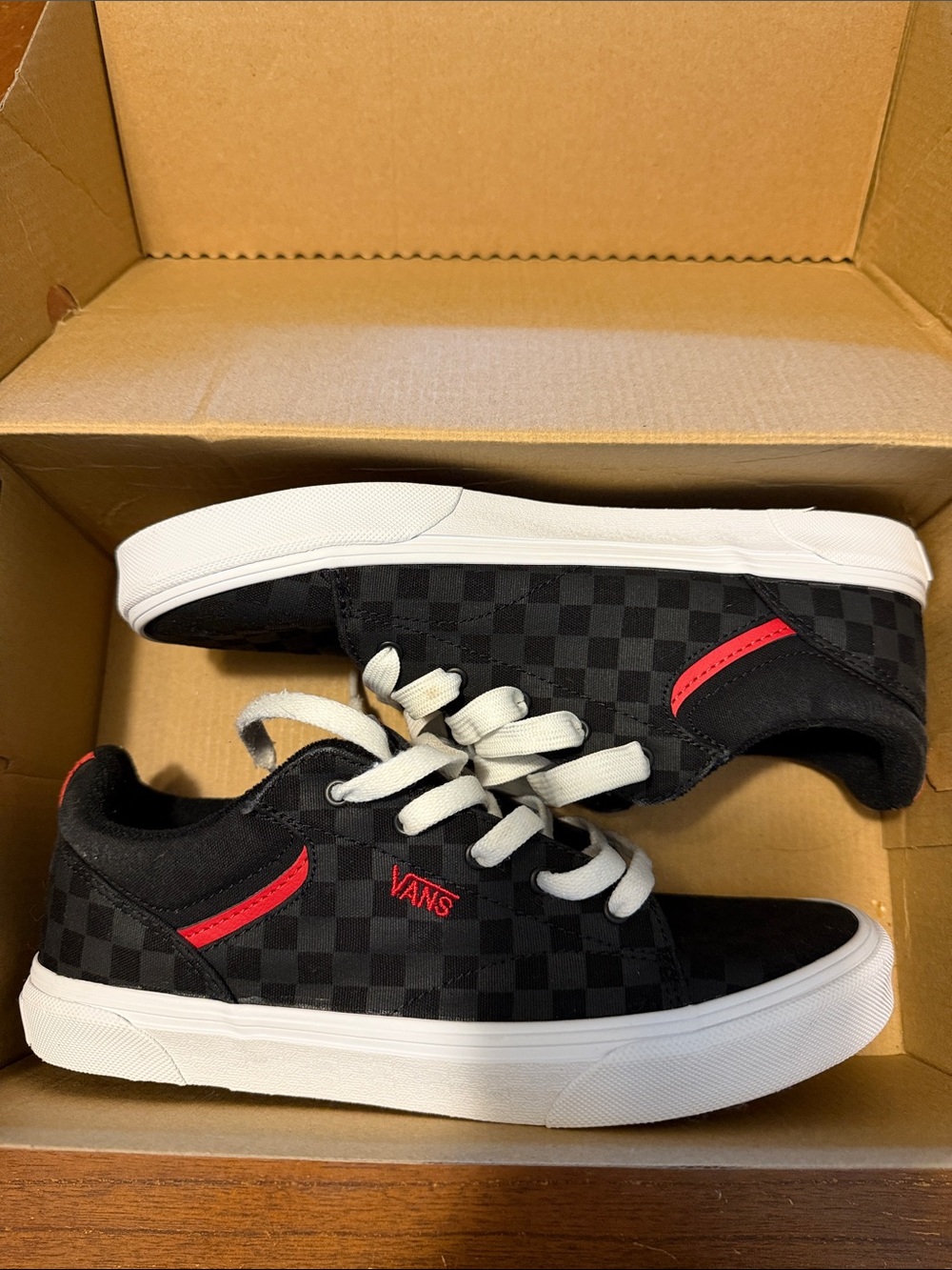Vans Black Checkerboard Low-Top Sneakers with Red Accents